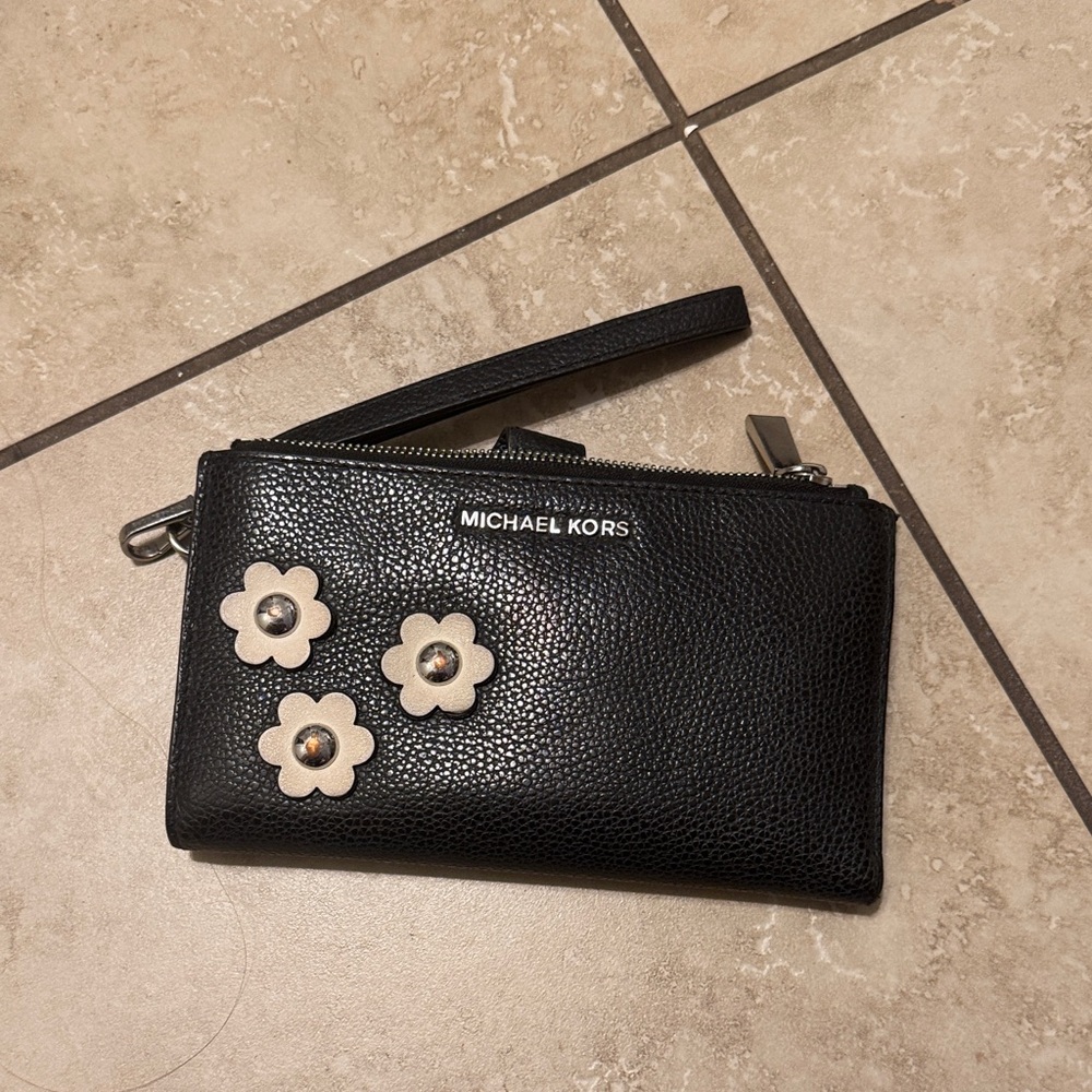 Michael Kors Black Wristlet with Cream Floral Details